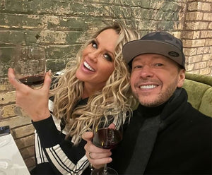 Jenny McCarthy and Donnie Wahlberg pop into Scott Harris Hospitality's newest concept and St. Charles hotspot, Mio Modo, after the annual holiday parade.